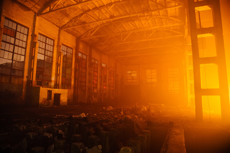 Fire in the factory. Burned by fire industrial building.の写真素材