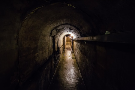 Dark corridor of old underground Soviet bunker under artillery fortification, Sevastopol, Crimeaの写真素材