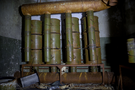 Ventilation chamber in abandoned Soviet bunker. Rusty filter ventilation equipment.の写真素材
