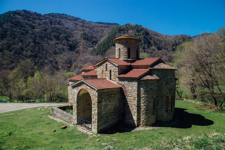 Old abandoned ancient Christian Church of Alanya in the Caucasus Mountains. Karachay-Cherkessia, Arkhyz, Russia.の写真素材