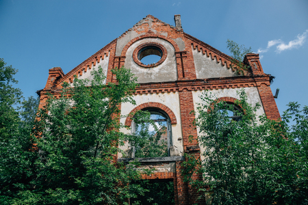 Ruins of German church. Overgrown ruined walls.の写真素材