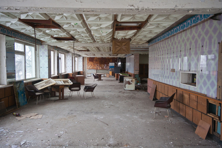 Ruined canteen for workers in abandoned factory.の写真素材