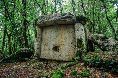 Ancient mysterious megalithic construction dolmen in Abkhazian forest, Azanta, Abkhaziaの写真素材