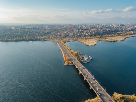 Aerial autumn Voronezh cityscape from drone flight height. View of the bridge over  Voronezh Water Reservoir.の写真素材