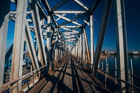 Railway track on steel railway bridge over Voronezh river.の写真素材
