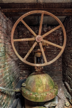 Big old rusty iron water gate valve