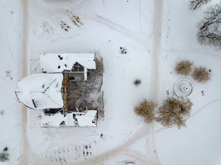 Aerial drone view of abandoned ruined former Venevitinov's mansion in Gorozhanka, Voronezh Region in winter.の写真素材