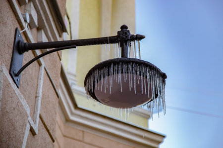 Icicles on street lantern.の写真素材