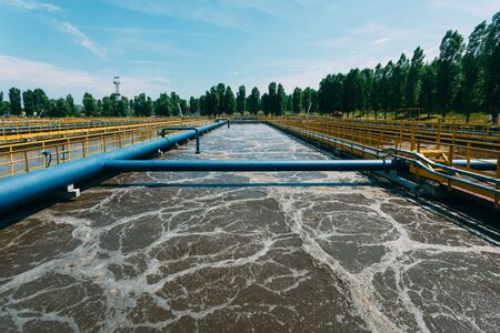 Modern wastewater treatment plant. Tanks for aeration and biological purification of sewage by using active sludgeの写真素材