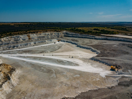 Open chalky quarry, aerial view from drone.