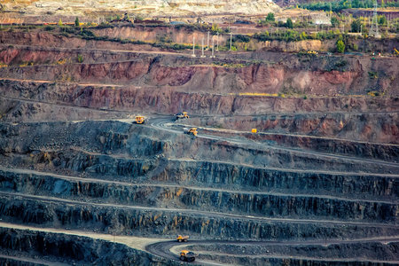 Open mining quarry. Dump mining trucks with ore.の写真素材