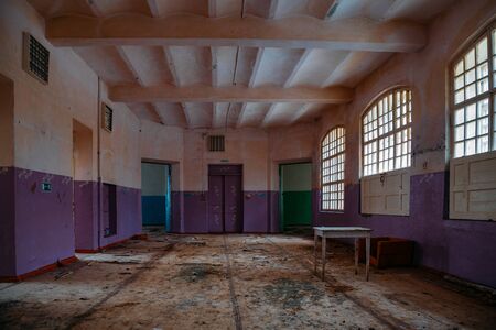 Inside old Orlovka Asylum for the insane in Voronezh Region. Dark creepy abandoned mental hospital.の写真素材