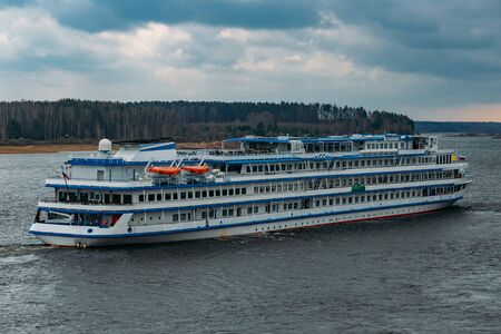 Cruise liner with tourists on the river Volga.の写真素材