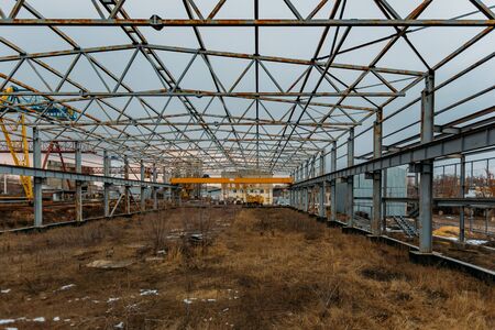Construction site in old industrial area of metalworking factory.の写真素材