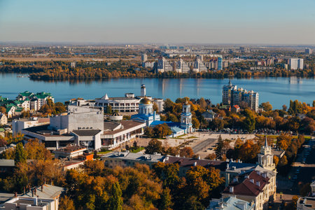 Sunny golden autumn Voronezh. Aerial view from skyscraper roof heigh.