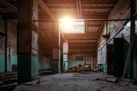 Old broken empty abandoned industrial building interior.の写真素材