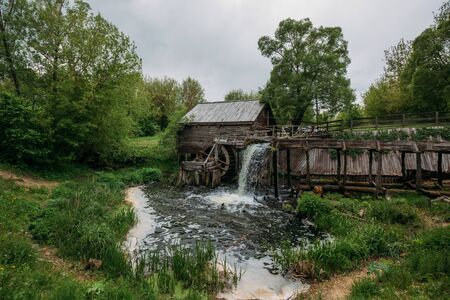 Old wooden log watermill in Russian village.の写真素材