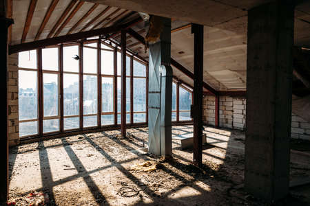 Dark abandoned industrial or office building attic.の写真素材