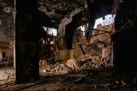 Burnt interior of industrial building or warehouse. Consequences of fire.