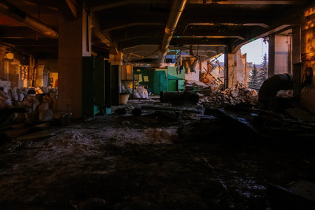 Ruined factory interior. Consequences of disaster, war or demolition.