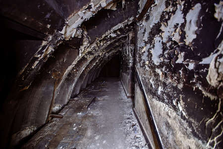 Dark burnt abandoned Soviet bunker after fire.の写真素材