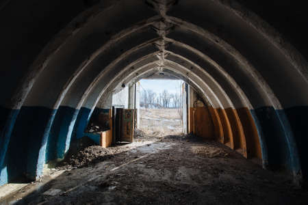 Abandoned underground depot in Soviet military base.の写真素材