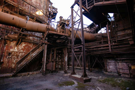 Old rusty blast furnace equipment of the metallurgical plant.の写真素材