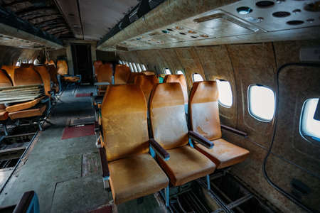 Inside of old abandoned passenger airplane. Plane wreck.の写真素材