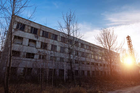 Old abandoned industrial building waiting for demolition.の写真素材
