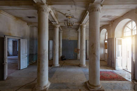 Old abandoned historical mansion, inside view.の写真素材