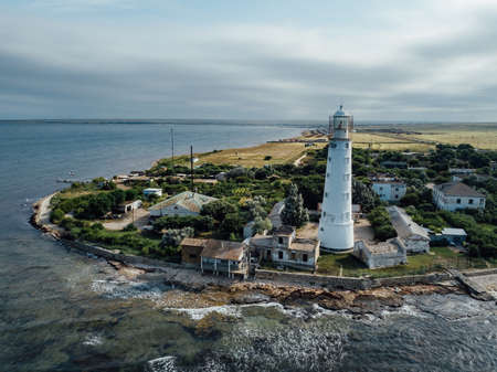 Lighthouse on the sea coast, aerial drone view.の写真素材