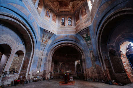 Interior of old abandoned Orthodox church of Smolensk icon of the mother of god with remnants of fresco.の写真素材