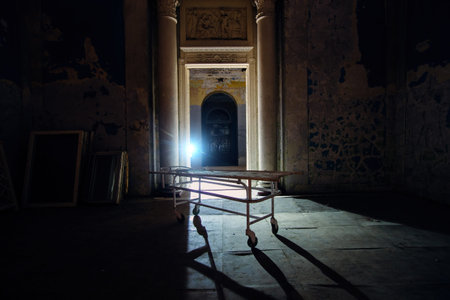 Inside of dark old creepy abandoned hospital at night.