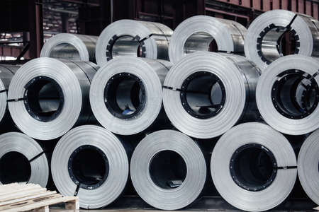 Rolls of galvanized steel sheet inside the factory or warehouse.の写真素材