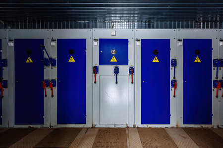 transformer box. Locked metal doors of switchgear cabinets.の写真素材