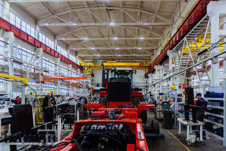 Assembly process of agricultural tractors in industrial workshop.の写真素材