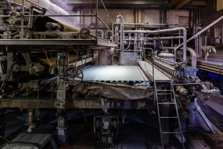 Waste paper recycling plant. Machine for production of paper rolls.の写真素材