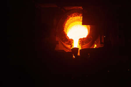 Metal casting process in metallurgical plant.の写真素材