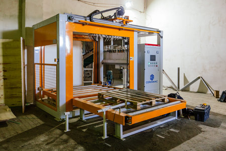 Cement packaging, bagging and stacking machine