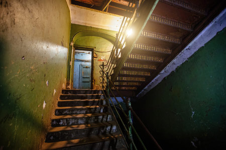 Old forged iron staircase in shabby historical building