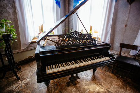 Old vintage piano in the houseの写真素材