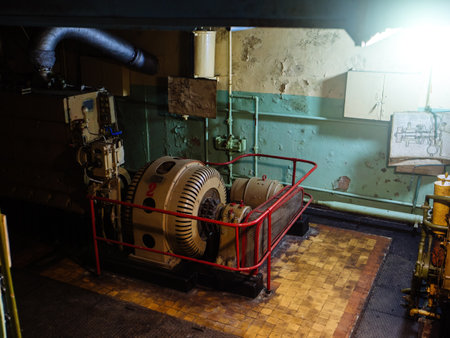 Old rusty diesel power generator in abandoned Soviet bunker.の写真素材