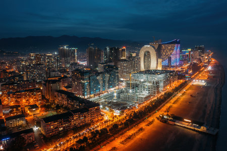 Drone aerial view of night Batumi City, Georgiaの写真素材