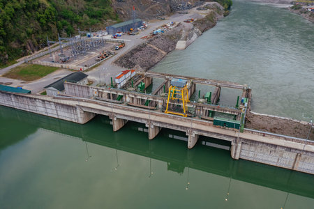 Dam of Kirnati Hydroelectric power plant on Chorokh river, Georgia, aerial drone view.