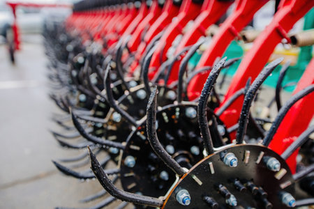 Working parts of modern rotary tooth harrow, close up.の写真素材
