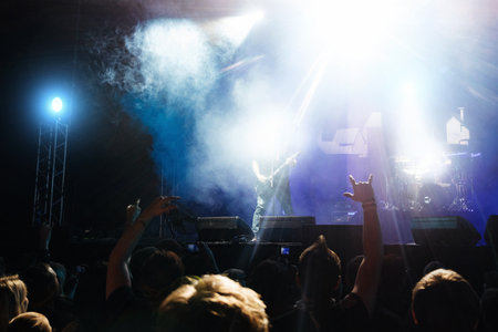Crowd of people on rock music performance.の写真素材