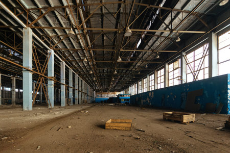 Old broken empty abandoned industrial building interior.の写真素材