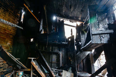 Aftermath of fire. Completely burnt house interior.の写真素材
