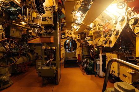 Inside old diesel military submarine.