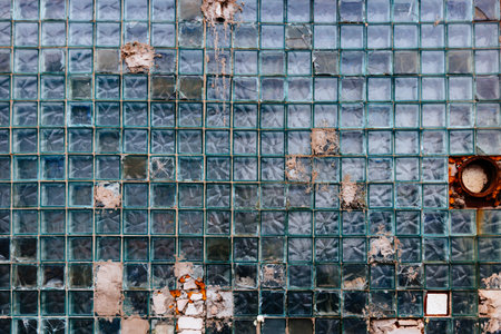 Broken glass block window background.の写真素材
